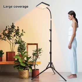 Fully extended height-adjustable stand supports tall plants with even lighting.