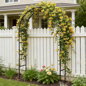 Fecita arch wide configuration creates a spacious garden entryway for photos.
