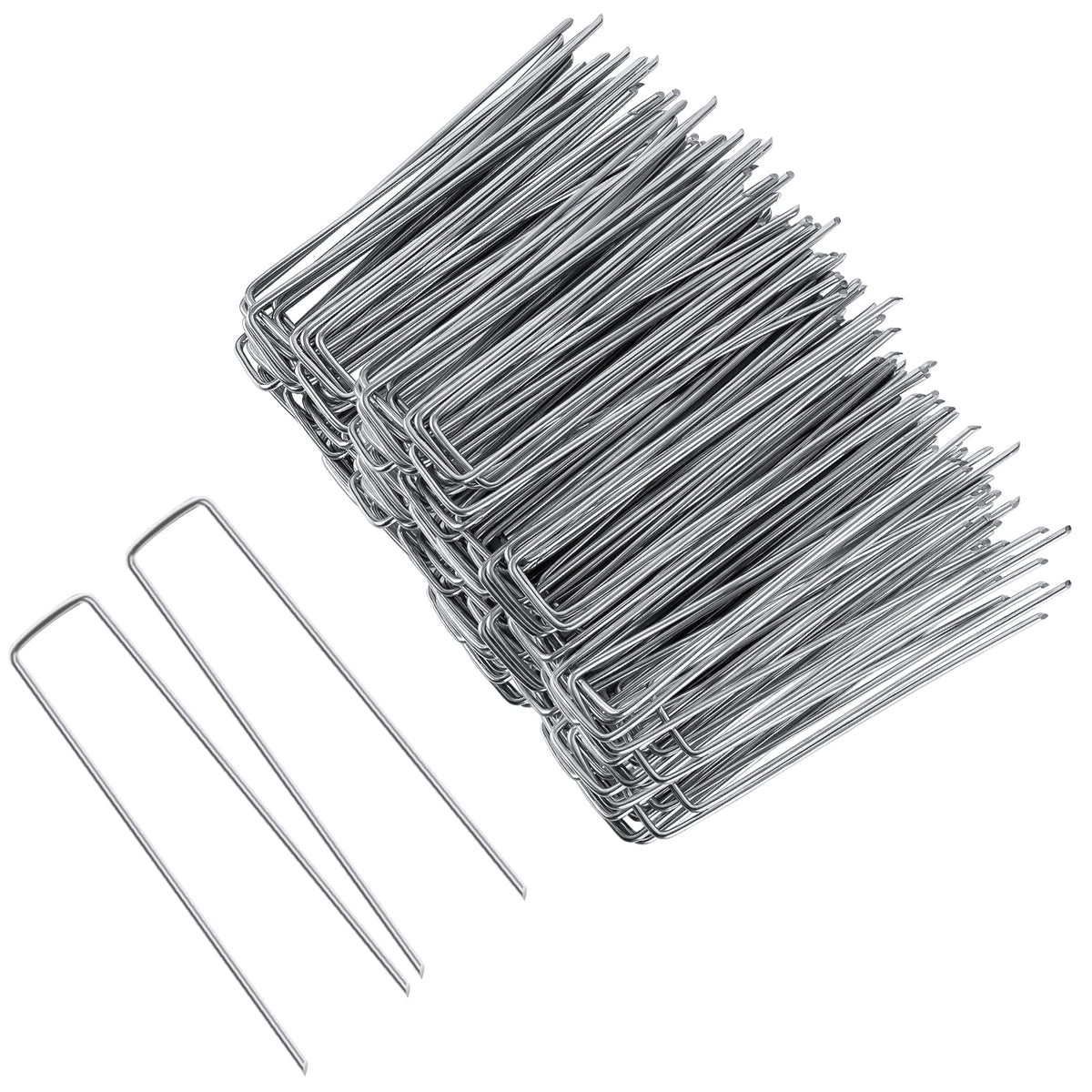 FEED GARDEN 8inch galvanized staple securing landscape fabric.