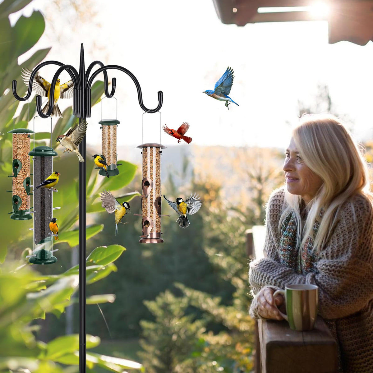 FEED GARDEN wind chimes displayed on four-hook shepherd hooks.