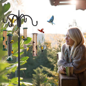 FEED GARDEN wind chimes displayed on four-hook shepherd hooks.