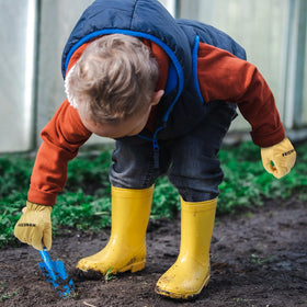 FEISHDEK kids glove in-use for safe outdoor gardening.