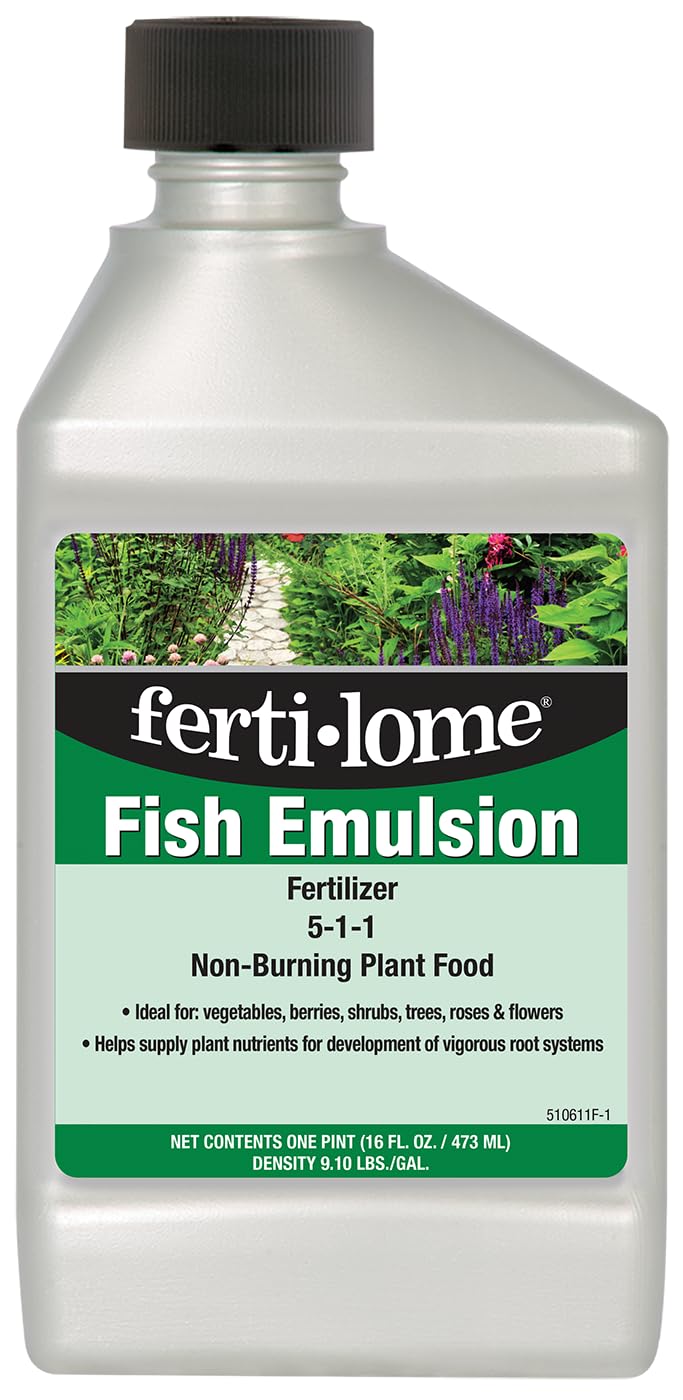 Ferti-lome fish emulsion bottle pour supports lush foliage growth