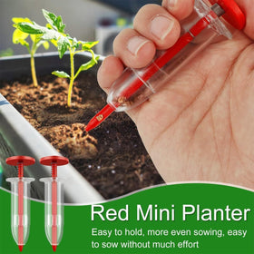 Fertile Rain handheld planter—reusable, durable tool for tiny seeds.