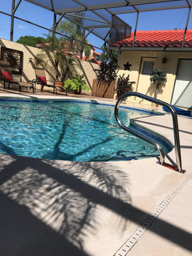 FibroPool stainless steel finish emphasizes corrosion resistance for outdoor pools.