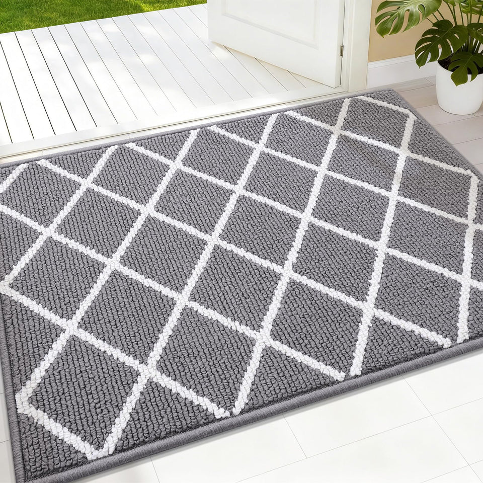 Finchitty indoor door mat absorbs moisture and traps dirt to keep floors dry.