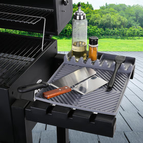 Find Law griddle mat acts as kitchen tool caddy for ladles and spoons