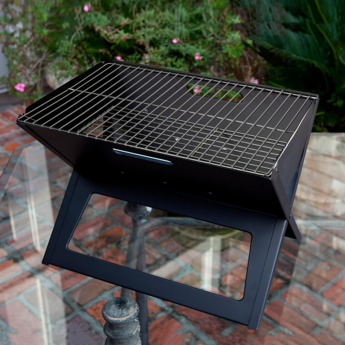 Fire Sense Notebook Grill compact folded form eases transport