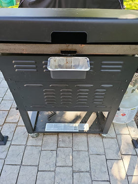 Firsgrill grease cup foil tray close-up highlighting pan lip design
