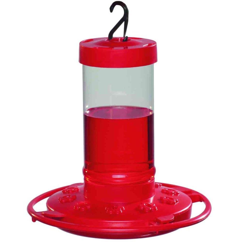 First Nature 4-Pack hummingbird feeder with red ports attracts birds and is easy to fill