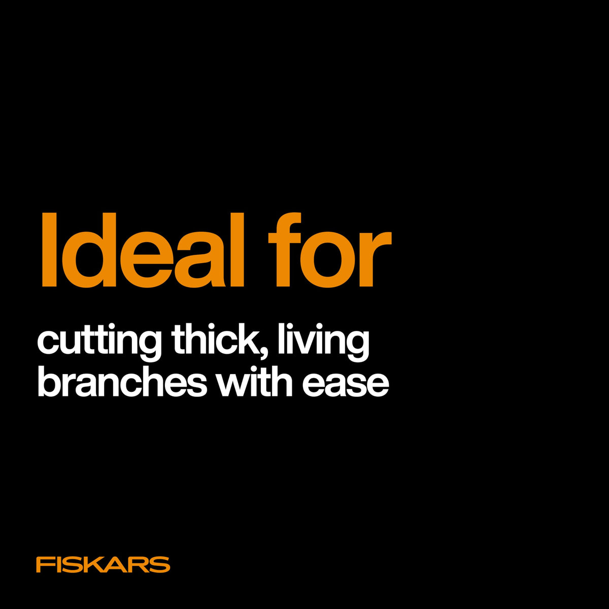 Fiskars lopper cutting thick branch demonstrates capability and precise cut.