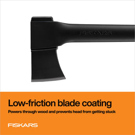 Wood-splitting action with Fiskars axe for efficient firewood prep