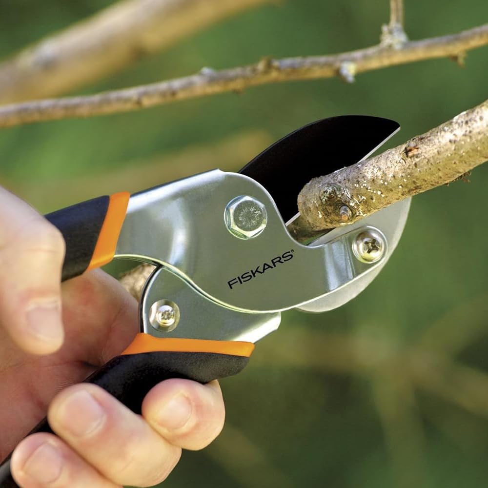 Fiskars Anvil Pruner in action with Power-Lever leverage for tough cuts
