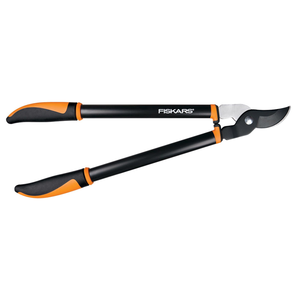 Fiskars bypass lopper 24in blade close-up for clean cuts on green growth