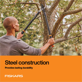 Fiskars lopper non-stick coating visible, promoting cleaner cuts and less sticking.