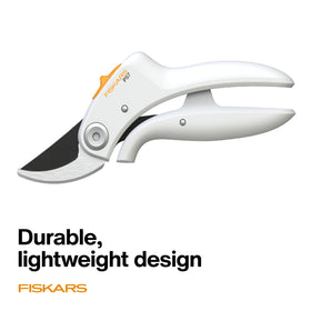Fiskars Bypass Pruner in hand during precise pruning task