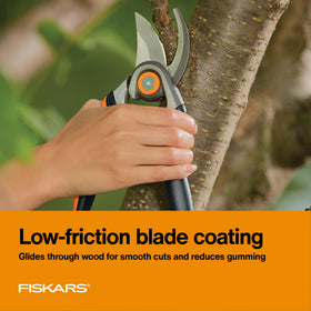 Fiskars bypass pruning shears showing forged steel durability in action