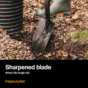 Fiskars digging shovel steel shaft provides sturdy leverage and durability.