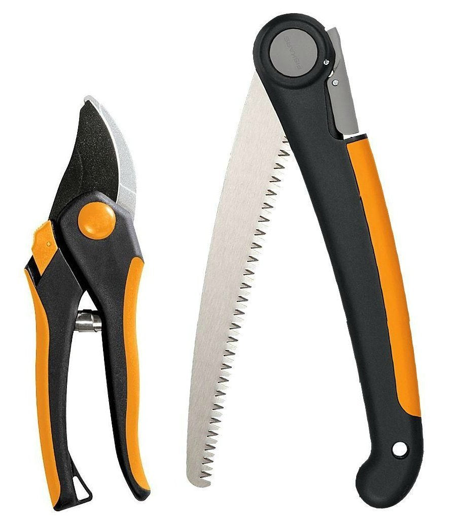 Fiskars folding saw and pruner set for precise pruning and easy garden maintenance.