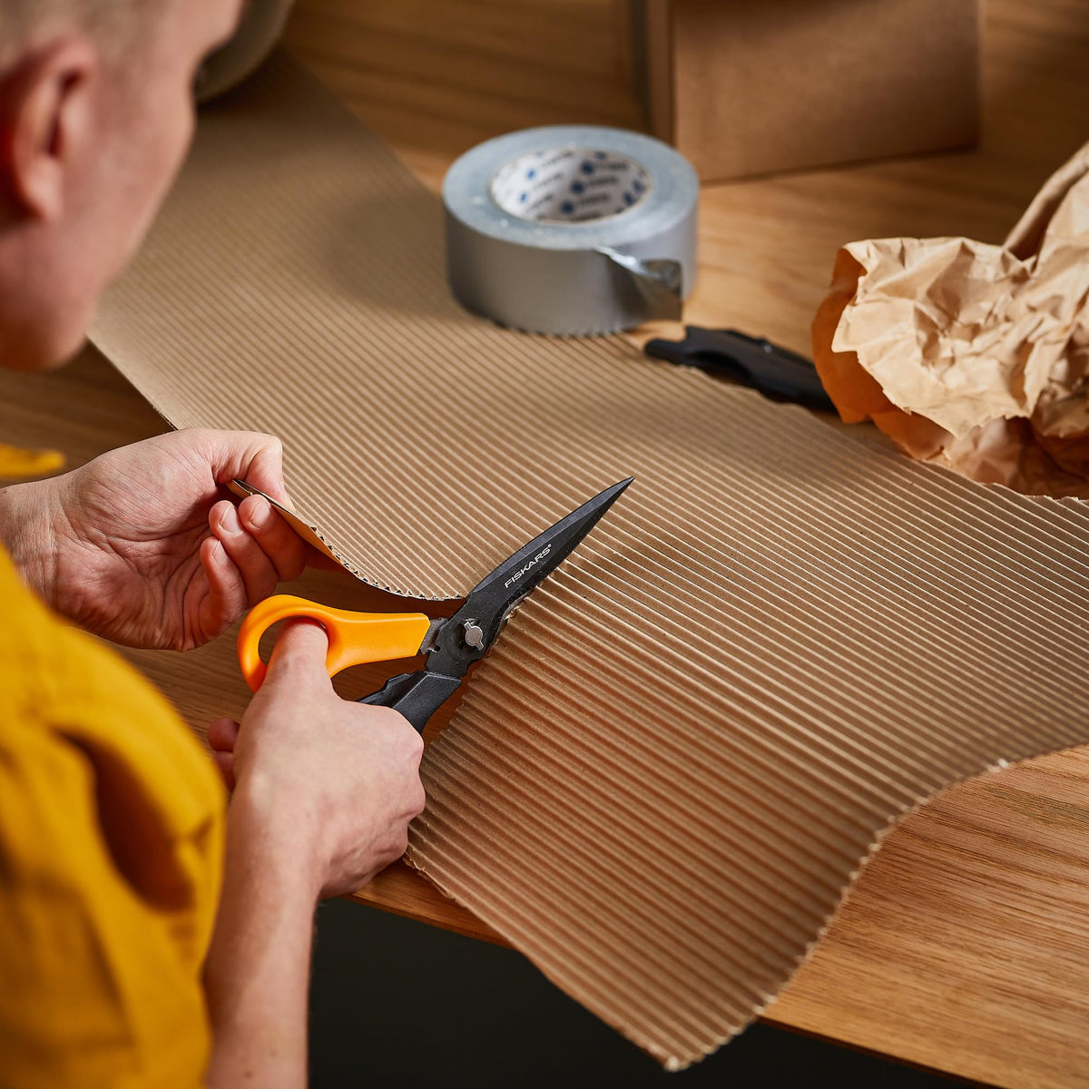 Fiskars Garden Scissors awl tip for piercing holes in cardboard or leather.