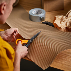 Fiskars Garden Scissors awl tip for piercing holes in cardboard or leather.