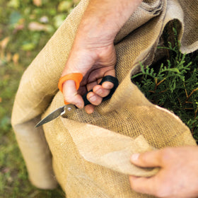 Fiskars Garden Scissors power notch enables cutting light rope with control.