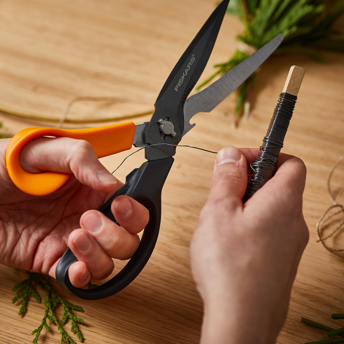 Fiskars Garden Scissors ceramic sharpener helps keep blades edge-ready.
