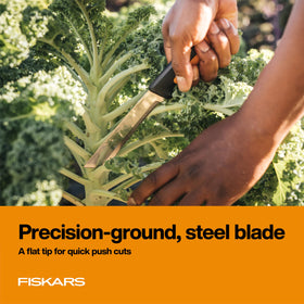 Fiskars Harvesting Knife serrated stem section for fibrous stems and clean slicing.