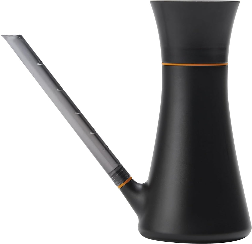 Fiskars Indoor Watering Can with long reach spout for precise root hydration.