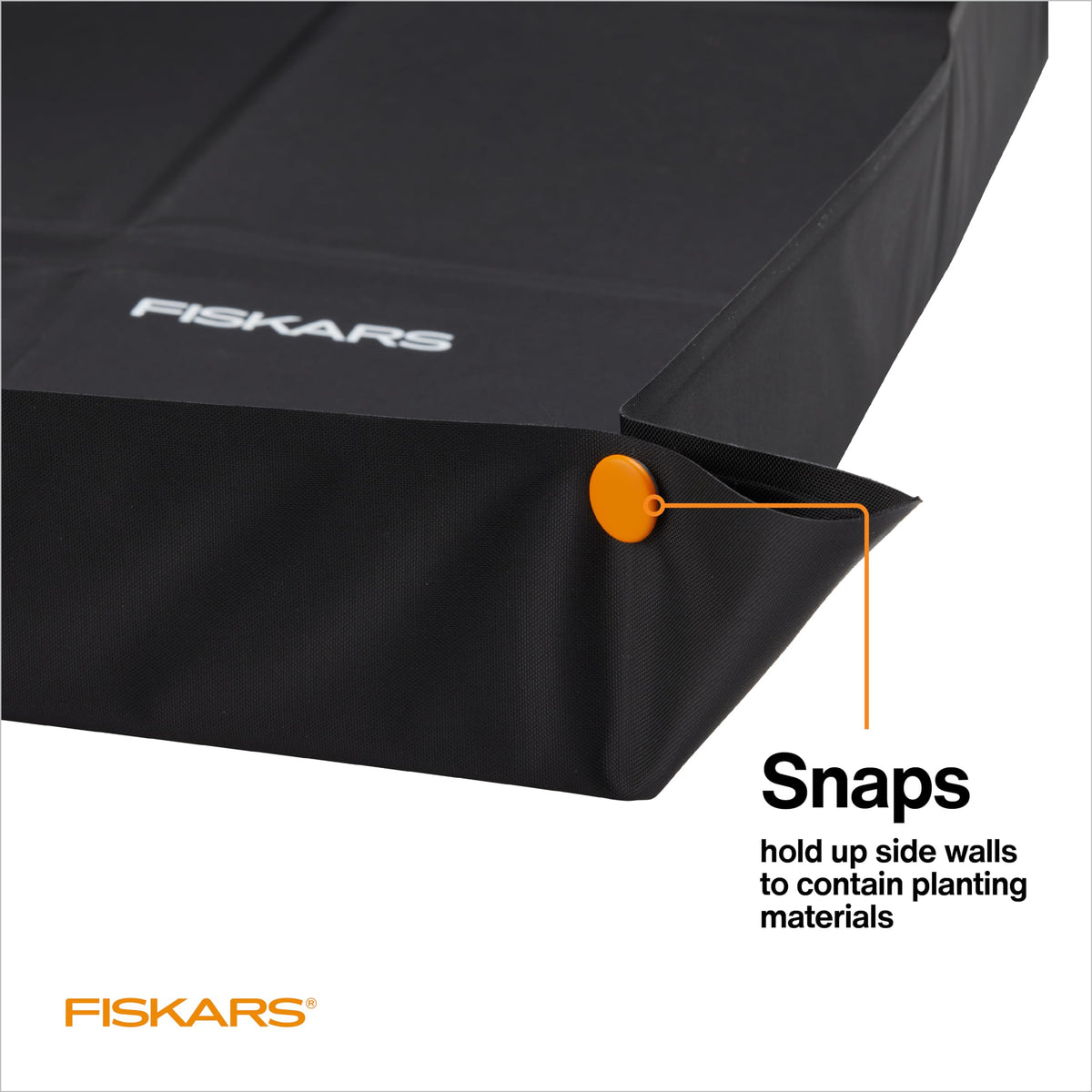 Fiskars repotting mat folded for storage keeps workspace tidy.