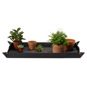 Fiskars repotting mat open area protects surfaces during transplanting and potting.