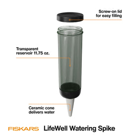 Fiskars spike inserted into soil delivers slow-release watering to roots.