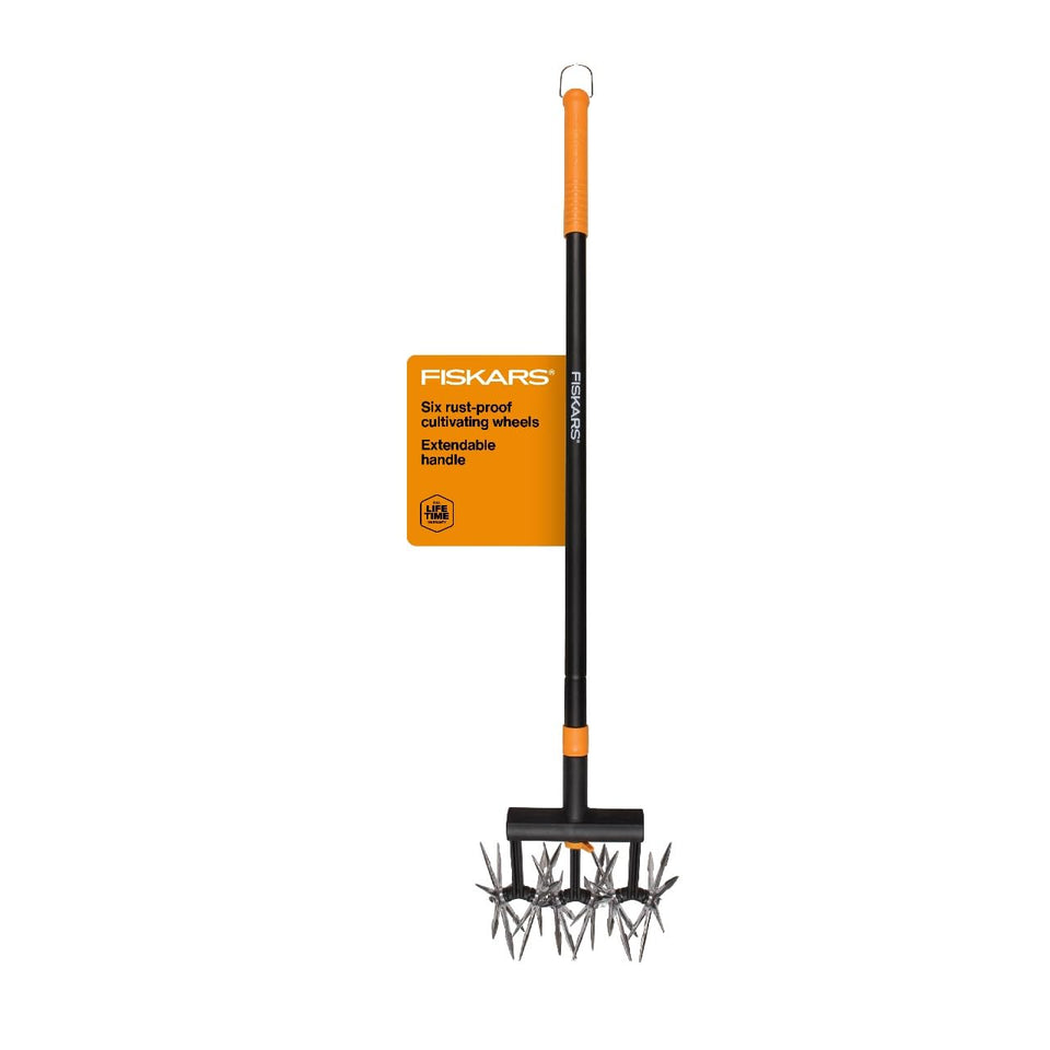 Fiskars Tiller Cultivator with extendable pole shows adjustable reach for comfortable tilling and weeding
