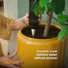 Fiskars transparent reservoir allows quick water level checks for plant care.