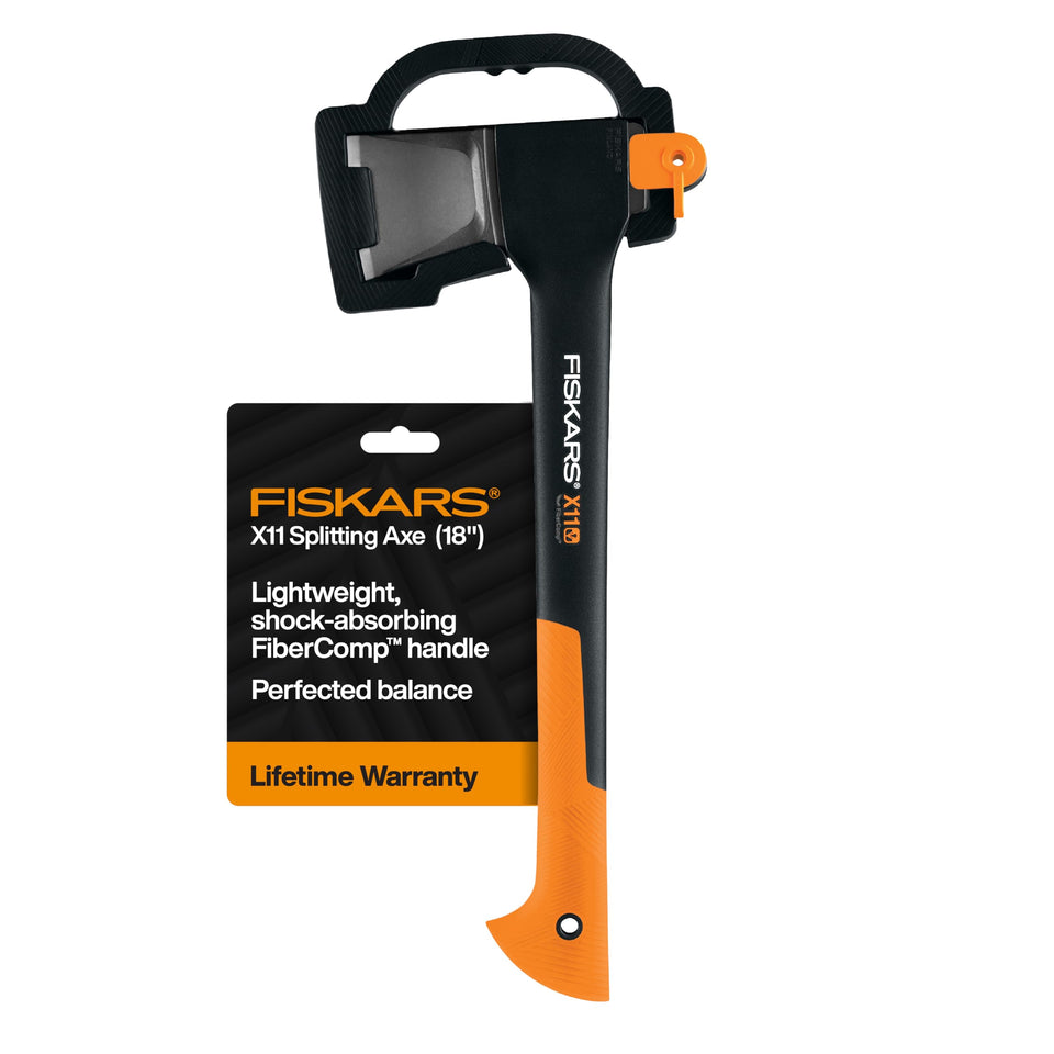 Fiskars X11 splitting axe blade close-up shows wedge-shaped geometry for easier splits.