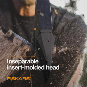 Fiskars X15 friction-reducing coating aids smooth pull-through on logs