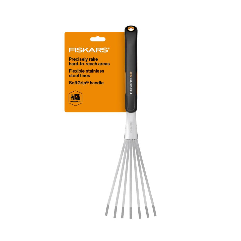 Fiskars Xact Hand Rake with stainless steel head for precise soil raking.