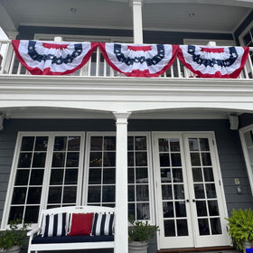 Flagolden embroidered bunting detail highlights durable stitching and classic look.