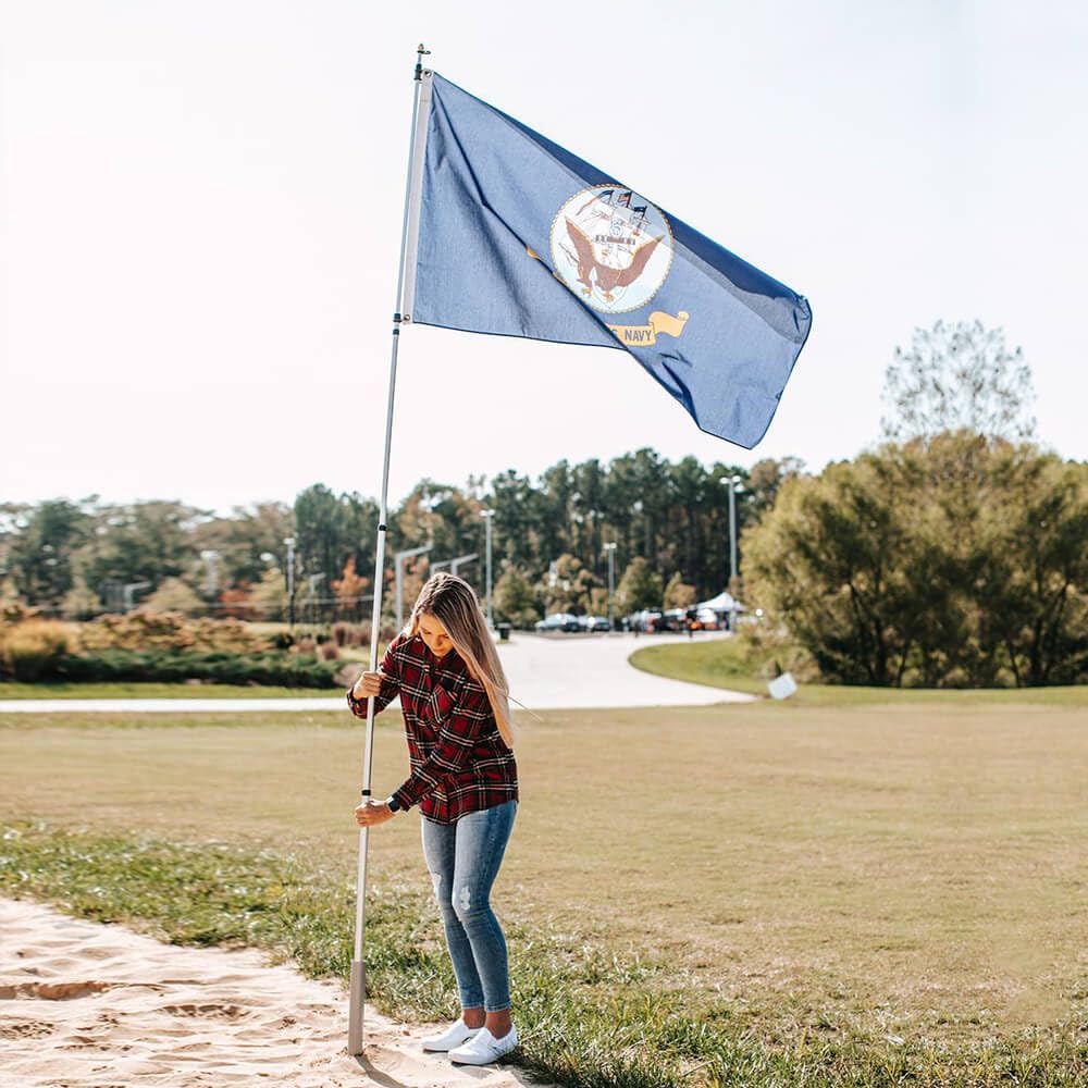 Flagpole-To-Go ready for parades, boosting visibility.