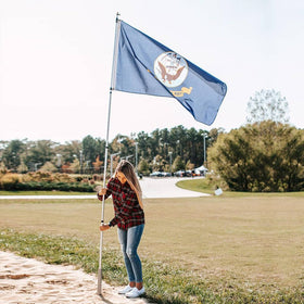 Flagpole-To-Go ready for parades, boosting visibility.