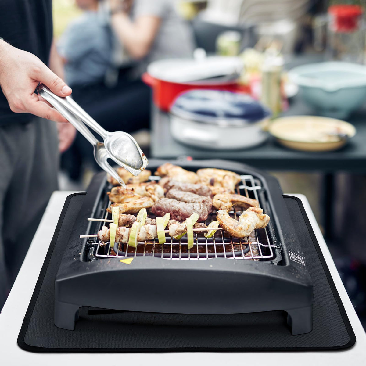 FLASLD waterproof grill table mat in black for easy cleanup