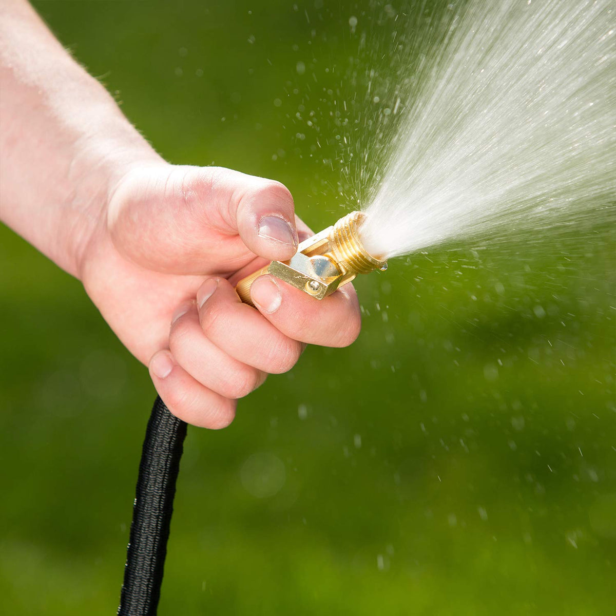 Flexi Hose in action for garden watering and car cleaning tasks.