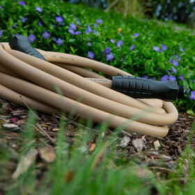 Flexzilla Colors SwivelGrip 50 ft hose ready for garden chores around the yard.