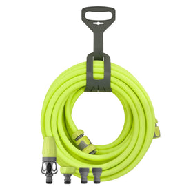 Flexzilla HFZG12050QN hose 50 ft stretched for easy yard watering.