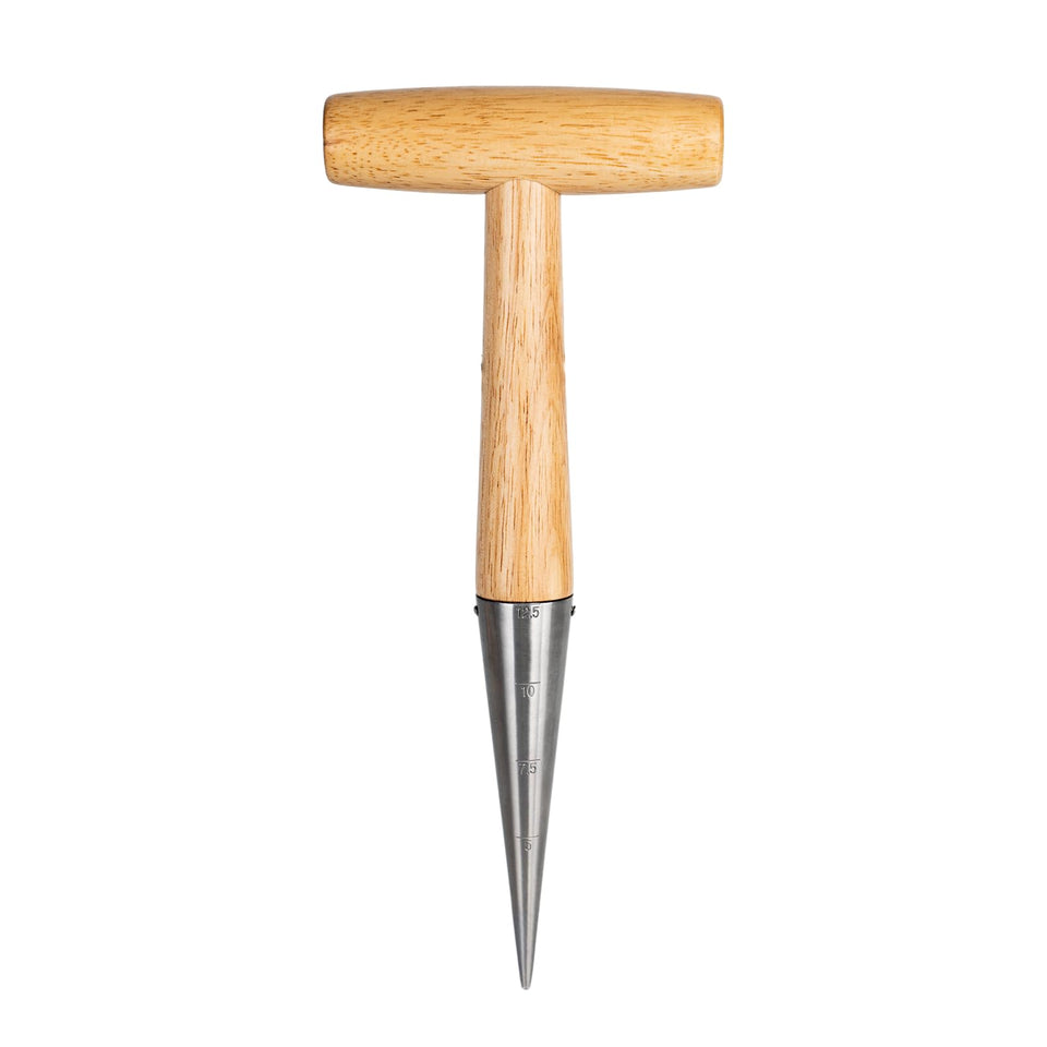 FLORA GUARD dibber with stainless-steel spike for precise seed holes in the garden.