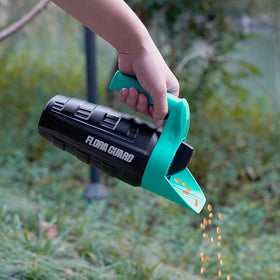 Compact FLORA GUARD spreader demonstrates 30 oz capacity for small to medium areas.