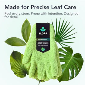 Flora Microfiber Gloves cleaning a Monstera leaf with a gentle touch.