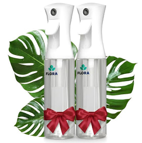 Flora premium plant mister bottle in hand for precise hydration