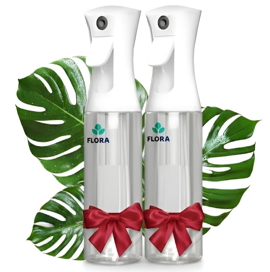 Flora premium plant mister bottle in hand for precise hydration
