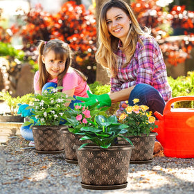 Flowyypo planter showing drainage holes and removable saucer for mess-free watering.